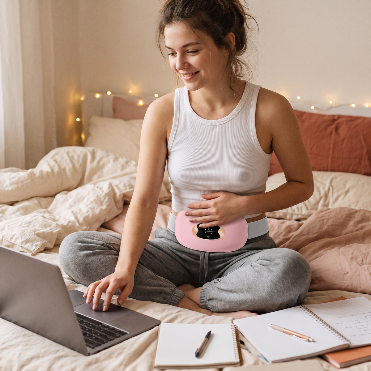 Warmwisp cordless heating belt in soft pink
